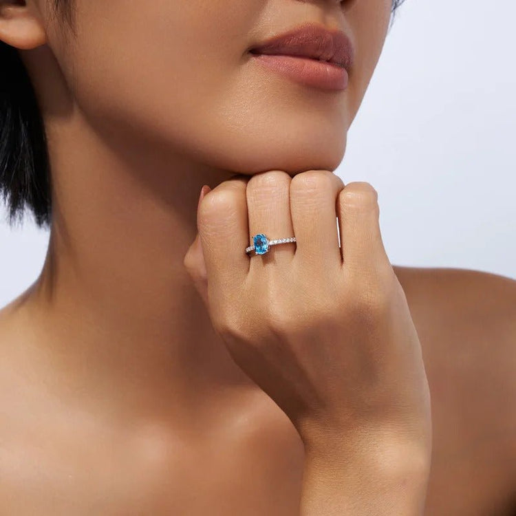 Oval Blue Topaz & CZ Halo Ring | S925 Silver 18K Gold Plated | 5×7mm Egg-Shape Center | 16 Pavé Stones | Charmsolo