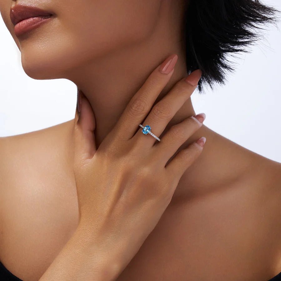 Oval Blue Topaz & CZ Halo Ring | S925 Silver 18K Gold Plated | 5×7mm Egg-Shape Center | 16 Pavé Stones | Charmsolo